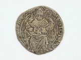une vieille pièce d'argent sur laquelle figure le portrait d'une femme