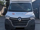 an image of a white van parked in a parking lot