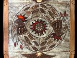 an image of a picture of a wooden plaque with birds on it