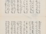 an old book with a page of music written on it