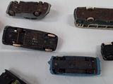 a lot of toy cars that are sitting on a table
