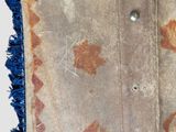 a close up of a piece of cloth with holes in it