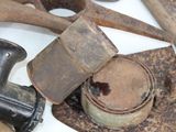 a lot of old tools that are laying on the table