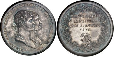 a close up of a coin with a woman ' s face on it