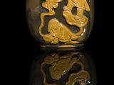 chinese snuff bottle decorated with a dragon and a fish