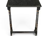 a black and gold side table on a white background