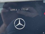 a picture of a car dashboard with a mercedes logo on it