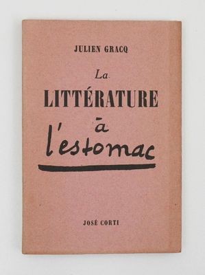 a pink book with black writing on the cover of it