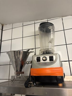 a blender sitting on a counter in a kitchen