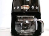 a coffee maker that is sitting on a table