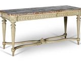 une table avec un plateau en marbre sur fond blanc