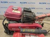 an image of a honda engine on a red lawn mower