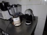 a blender sitting on a counter in a kitchen