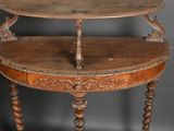 an old wooden table with two shelves on top of it