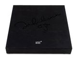 a close up of a box with a signature on it