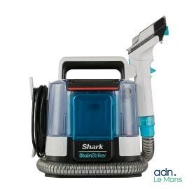 the shark canister vacuum cleaner is being used on a white background