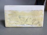 a picture of a piece of art with a drawing on it