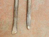 two tools that are laying on the floor