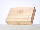a wooden box with a logo on it sitting on a table