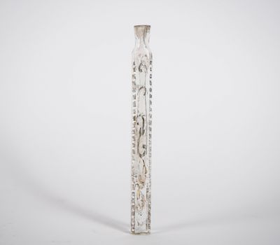an image of a tall glass vase sitting on top of a table