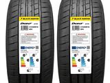 a pair of tires with a sticker that says vendu par lot de 2