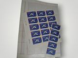 some stamps are sitting on top of a piece of paper