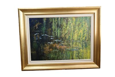 tableau représentant un étang avec des arbres et des nénuphars, dans un cadre doré