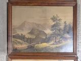 trois tableaux encadrés représentant un paysage de montagne, accrochés au mur