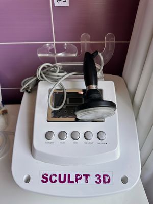 a white machine that is sitting on top of a toilet