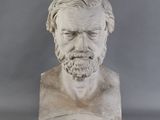 marble bust of a man with a beard and a mustache