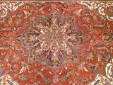 an image of a red carpet with a medallion design on it