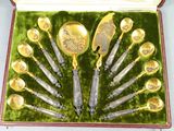 a box with a set of silver spoons and spoon spoons in it