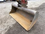 a bulldozer that is sitting in the dirt
