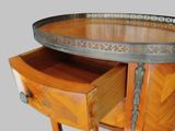 a wooden table with two drawers and a tray on top