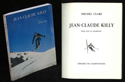 two books that are on a black table
