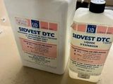two bottles of disinvest dtc on the counter
