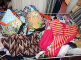 a basket full of underwear on a table in a room