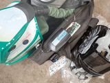 a motorcycle helmet, helmet, and other items on the ground