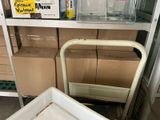 a cart that is sitting in front of some boxes