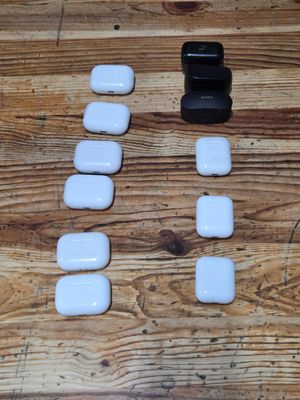 a wooden table with a number of white rocks on it
