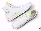 white converses with multi - colored soles on a white background
