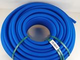 a blue hose on a white surface