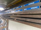 a lot of wood planks stacked on top of each other