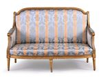 an image of a couch with a striped upholstered back