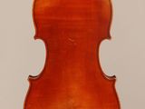 an old violin with a wooden back and a long neck