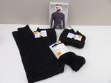 black pants and a pair of socks sitting on a table