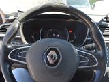 the steering wheel of a car with a steering control panel