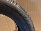 a close up of a tire with a box in the background