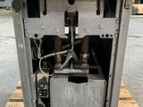 a machine that is sitting on top of a pallet