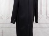 the back of a black coat on a mannequin mannequin mannequin mannequin mannequin mannequin mannequin mannequin